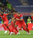 England Players Celebrate following shoot out victory